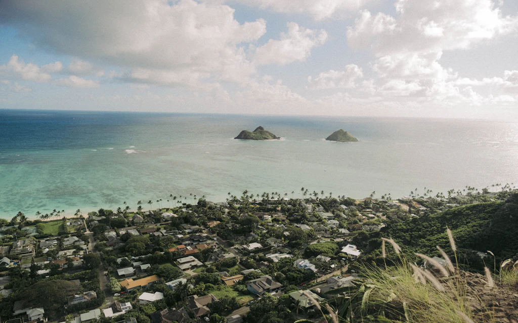 View of the Honolulu skyline and ocean from the summit of Diamond Head, one of the best hikes on Oahu