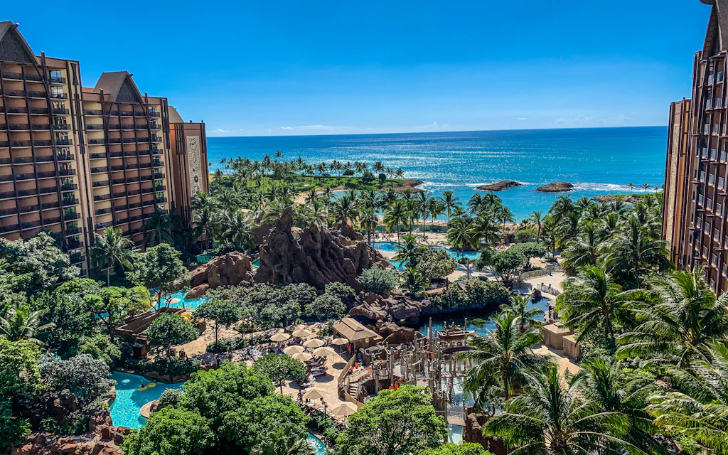 Aerial view of Aulani, Disney's Ko Olina resort on Oahu, its two towers framing the Waikolohe Valley pool complex