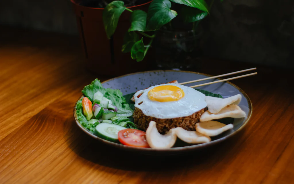 A savory rice plate topped with a fried egg, like Hawaii's loco moco